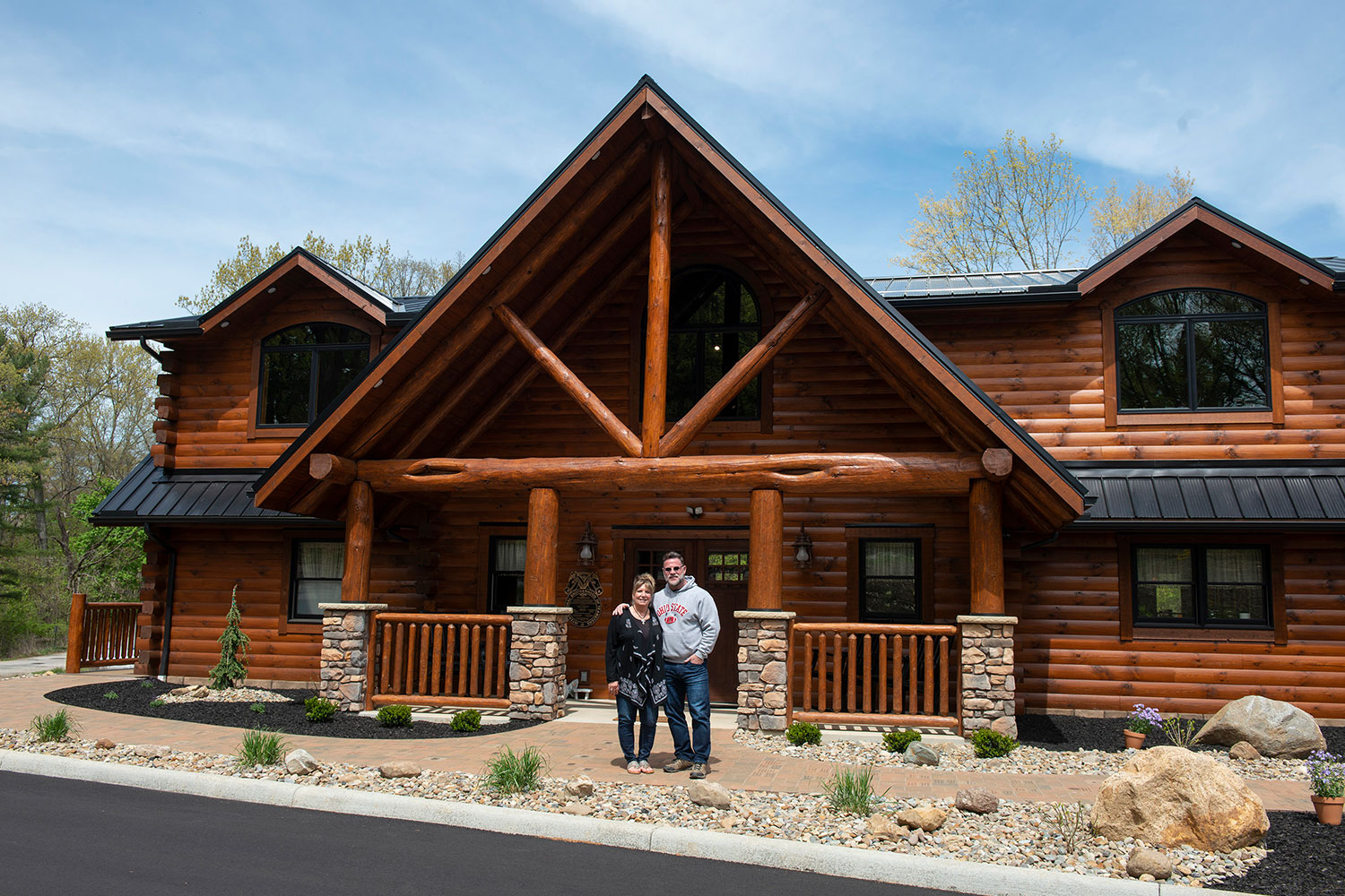 Travis and Shelly Bornstein posing for a photo outside Tyler's Redemption Place